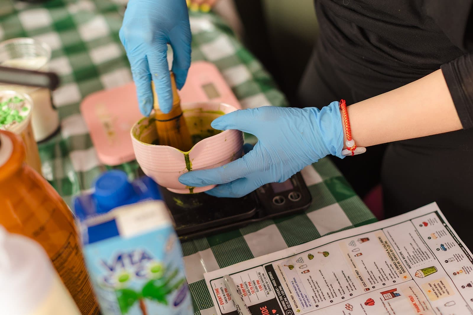 Whisking matcha at the coffee cart